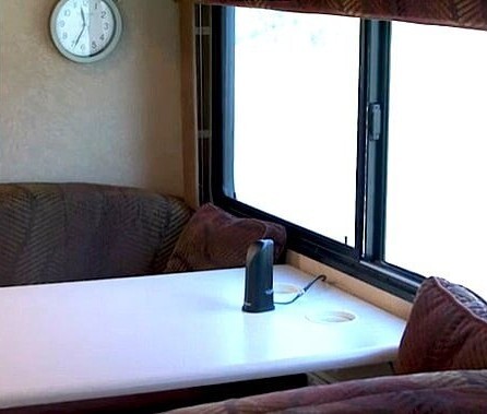 desktop antenna setup on a table in an RV